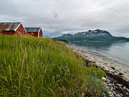 Photo from the beach at midnight in northern Norway