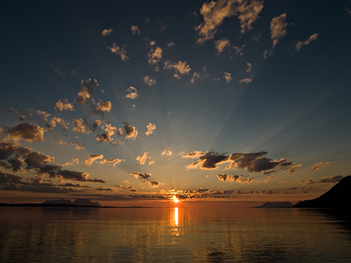 Wide angle picture of sunset on a beach in northern Norway