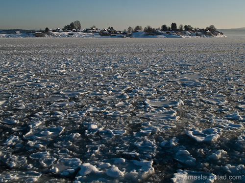 Picture from the Oslofjord, Norway covered with broken ice