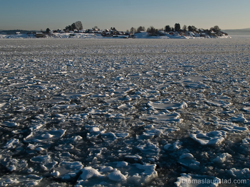 Picture from the Oslofjord, Norway covered with broken ice